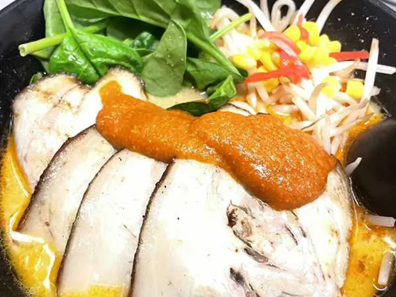 Rich tonkotsu ramen with tender chashu and veggies at J Sushi & Ramen , a Japanese Restaurant in Pomona