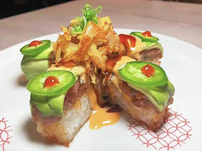 Crispy tuna roll topped with avocado and spicy sauce at J Sushi & Ramen , a Japanese Restaurant in Pomona